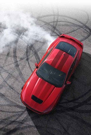 Overhead view of a 2024 Ford Mustang® model with tire tracks on pavement | Eau Claire Ford Lincoln in Eau Claire WI